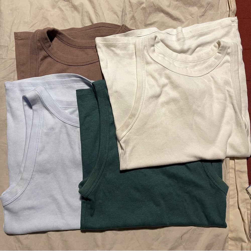 A new day tank top bundle of 4